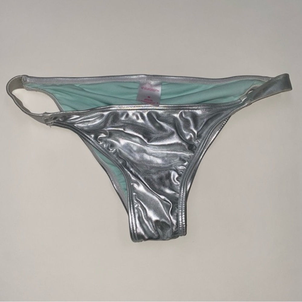 Cute metallic silver bikini bottom, in good condition.